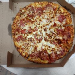 Domino's Pizza - Double cheese double pepperoni pizza. Beautiful presentation isn't it