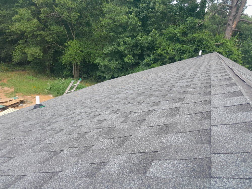 Slide of Supreme Stich Roofing