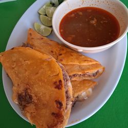 Alanbertos Express - Birria meat was lacking flavor. Consomme was not fatty but just so-so on flavor. Tortillas shredded and fell apart.