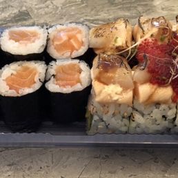 Takeout order of salmon maki (left) and the signature Japango roll (right). Takeout order of salmon maki (left) and the signature Japango roll (right).