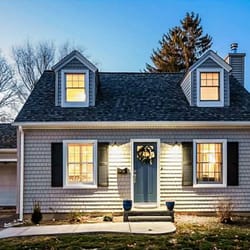 Stormtite Home Improvement - Complete remodel of a 1940's cape in East Greenwich; Mastic Cedar Discovery/Carvedwood Siding, Certainteed Roofing, Therma Tru door.