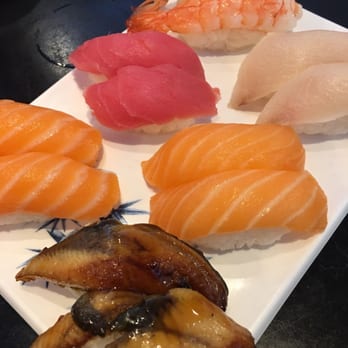 Nami Sushi - Salmon (orange), tuna (red), eel (brown), and shrimp (the shrimp) - Sushi Bars Near Me - Davis, California Nami Sushi - Salmon (orange), tuna (red), eel (brown), and shrimp (the shrimp) - Sushi Bars Near Me - Davis, California