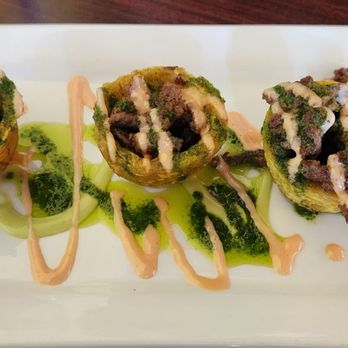 Sabor Tropical Restaurant and Lounge - Tostones rellenos con carne (Tostones rellenos with steak) - Latin American Near Me - Milwaukee, Wisconsin Sabor Tropical Restaurant and Lounge - Tostones rellenos con carne (Tostones rellenos with steak) - Latin American Near Me - Milwaukee, Wisconsin