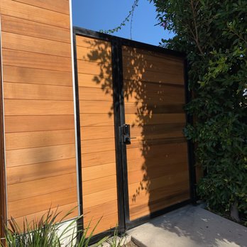 MANDA Gates and Fences - Black metal and cedar plant pedestrian gate - Fences & Gates Near Me - Tarzana, California