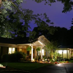 Brookside Mountain Mist Inn B&B - Front view of Inn at night with uplighting.