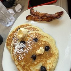Blueberry pancakes and bacon