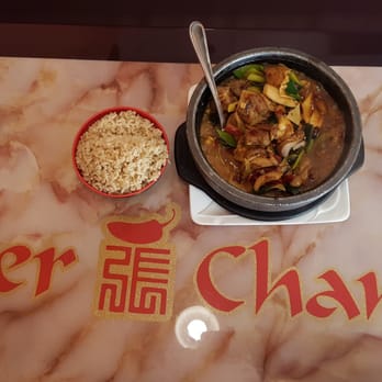 Peter Chang - Duck in a hot pot with brown rice ($1 for brown rice and $20 for duck) - Asian Fusion Near Me - Glen Allen, Virginia