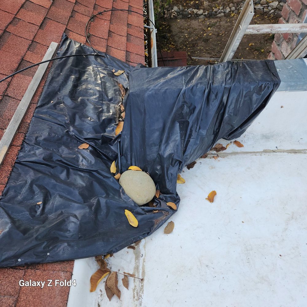 Slide of Mountain Roofing Systems