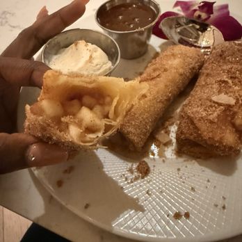 Bridges Lobby Bar - Apple pie spring rolls. Vanilla bean gelato. Salted caramel - Bars Near Me - Chicago, Illinois Bridges Lobby Bar - Apple pie spring rolls. Vanilla bean gelato. Salted caramel - Bars Near Me - Chicago, Illinois