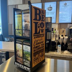 Queen’s Beans - Bigelow tea, limited selection.  English breakfast tea would be a nice addition.