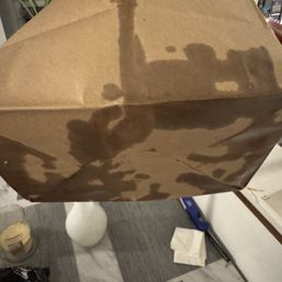 So much grease that it stained the brown bag So much grease that it stained the brown bag