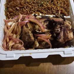 Jollof Cafe & Grill - Dibi chicken and jollof rice