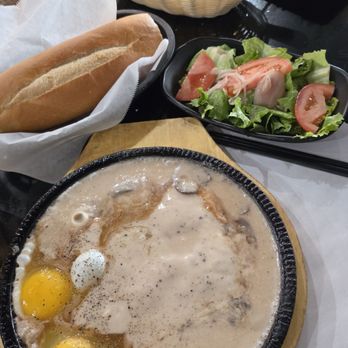 Grandpa's Kitchen - Grill Bar 168 - Watery mushroom sauce/gravy in excess covering the steak. 1/5 for the bo ne. - Vietnamese Near Me - Garden Grove, California
