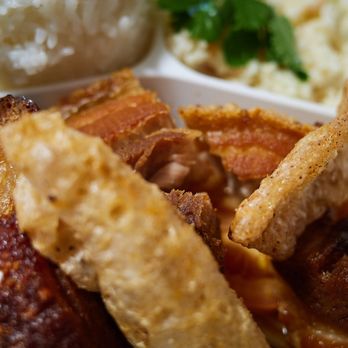 Feast - Chicharrones w/ tomato onion lechon sauce (Close-up) - Hawaiian Near Me - Honolulu, Hawaii Feast - Chicharrones w/ tomato onion lechon sauce (Close-up) - Hawaiian Near Me - Honolulu, Hawaii