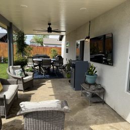 Tv install with full motion wall mount.