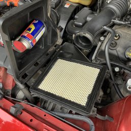 WD-40 bottle in the air intake left by T&T Auto Repair WD-40 bottle in the air intake left by T&T Auto Repair