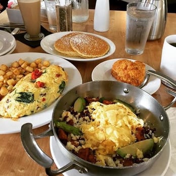 Buttermilk - L: The Goat Omelet. R: Skillet Red Rooster with Scramble egg. Behind it Biscuit, remind me of Georgia, Southern home cooked. Mmmmmmm.. Yum! - Coffee & Tea Near Me - Geneva, Illinois Buttermilk - L: The Goat Omelet. R: Skillet Red Rooster with Scramble egg. Behind it Biscuit, remind me of Georgia, Southern home cooked. Mmmmmmm.. Yum! - Coffee & Tea Near Me - Geneva, Illinois