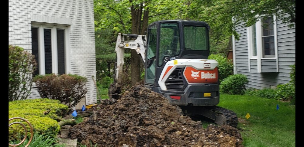 Slide of Father and Son's Plumbing