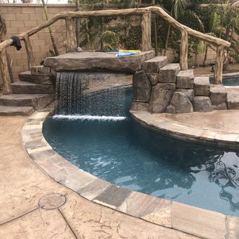 Premier Pools & Spas - Lazy river / bridge rain descent feature - Pool & Hot Tub Service Near Me - Ontario, California Premier Pools & Spas - Lazy river / bridge rain descent feature - Pool & Hot Tub Service Near Me - Ontario, California