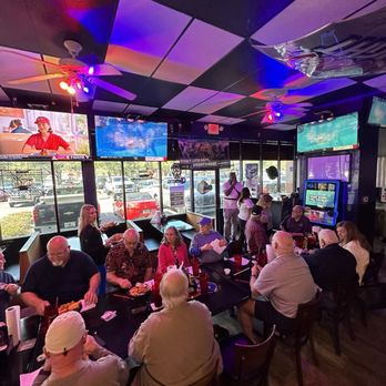 Mr. Chubby's Wings -  Jacksonville -  large group of people sitting at a table - Chicken Wings Near Me - Jacksonville, Florida