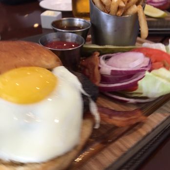 Champions Bar & Grill - Burger w/ egg and bacon - New American Near Me - Miami, Florida