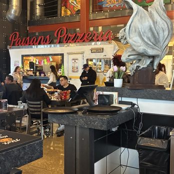 Paisans Pizzeria - They wedged a camper into the restaurant. Who would have thought. - Pizza Near Me - Oak Lawn, Illinois Paisans Pizzeria - They wedged a camper into the restaurant. Who would have thought. - Pizza Near Me - Oak Lawn, Illinois