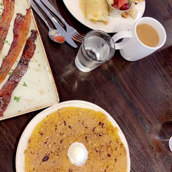 First Watch - Banana Granola Crunch Pancake a shared side of Million Dollar Bacon and a "chickichanga" - Breakfast & Brunch Near Me - Bellevue, Nebraska First Watch - Banana Granola Crunch Pancake a shared side of Million Dollar Bacon and a "chickichanga" - Breakfast & Brunch Near Me - Bellevue, Nebraska