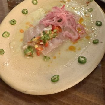 La Minerva - Tiradito Dorado $14.00 Mahi mahi, lime, ginger, serrano, pico de gallo, pickled onion. - Mexican Near Me - North Charleston, South Carolina