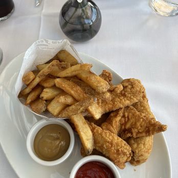 Artisan - chicken tenders and fries with mustard (i also asked for bbq) - New American Near Me - Traverse City, Michigan