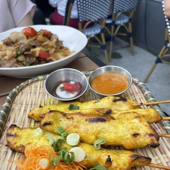 Sisters Thai - Chicken Satay - Marinated chicken skewered with peanut sauce - Thai Near Me - Fairfax, Virginia Sisters Thai - Chicken Satay - Marinated chicken skewered with peanut sauce - Thai Near Me - Fairfax, Virginia