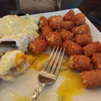 Grain Craft Bar + Kitchen - Eggs Benedict (comes with 2) with black forest ham and avocado hollandaise. - New American Near Me - Newark, Delaware