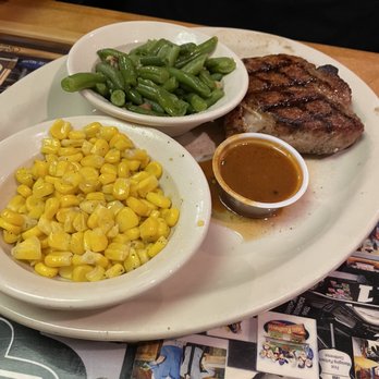 Texas Roadhouse - Single portion pork chop (pepper corn sauce) w/ buttered corn & green beans - American Near Me - Nottingham, Maryland Texas Roadhouse - Single portion pork chop (pepper corn sauce) w/ buttered corn & green beans - American Near Me - Nottingham, Maryland