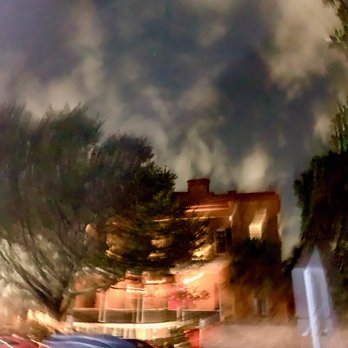 History, Haunts and Hops - a blurry image of a street at night - Walking Tours Near Me History, Haunts and Hops - a blurry image of a street at night - Walking Tours Near Me