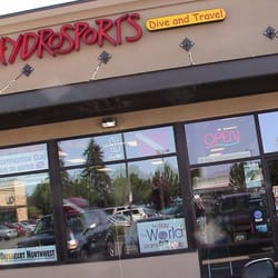 HydroSports Dive and Travel - Looking at the front windows from the parking lot of Keizer Village Shopping Center. HydroSports is next door to golds Gym.