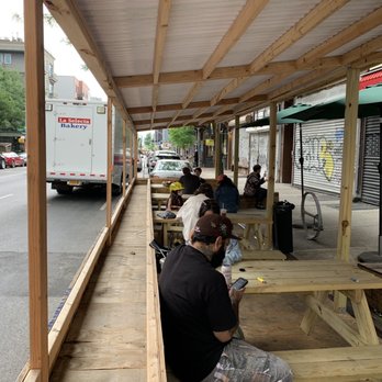 Greenberg’s Bagels - a group of people sitting at picnic tables - Bagels Near Me - Brooklyn, New York Greenberg’s Bagels - a group of people sitting at picnic tables - Bagels Near Me - Brooklyn, New York