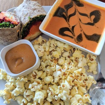 Communitea Cafe - Mountain Veggie Wrap w. miso dressing & side of popcorn. +$5 upcharge for the Coconut Tomato Soup w. Cilantro Pesto - Gluten-Free Near Me - Canmore, Alberta