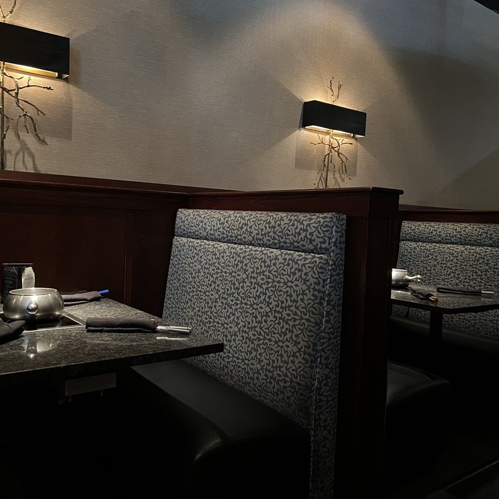 The Melting Pot - Booths in the restaurant - Fondue Near Me - Orlando, Florida The Melting Pot - Booths in the restaurant - Fondue Near Me - Orlando, Florida