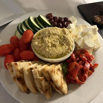 Anna's Harborside Grille - Hummus appetizer. I order this for dinner sometimes. So darn fresh and tasty. Hummus is amazing. Feta, yummy! - American Near Me - Plymouth, Massachusetts Anna's Harborside Grille - Hummus appetizer. I order this for dinner sometimes. So darn fresh and tasty. Hummus is amazing. Feta, yummy! - American Near Me - Plymouth, Massachusetts