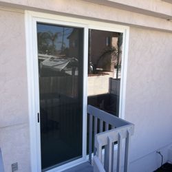 Cali Glass & Windows - White vinyl retro fit sliding glass door sale and installation b y Cali Glass and windows.