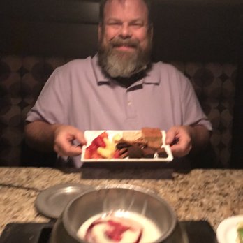The Melting Pot - Desert - white chocolate with raspberries. - Fondue Near Me - Albuquerque, New Mexico The Melting Pot - Desert - white chocolate with raspberries. - Fondue Near Me - Albuquerque, New Mexico