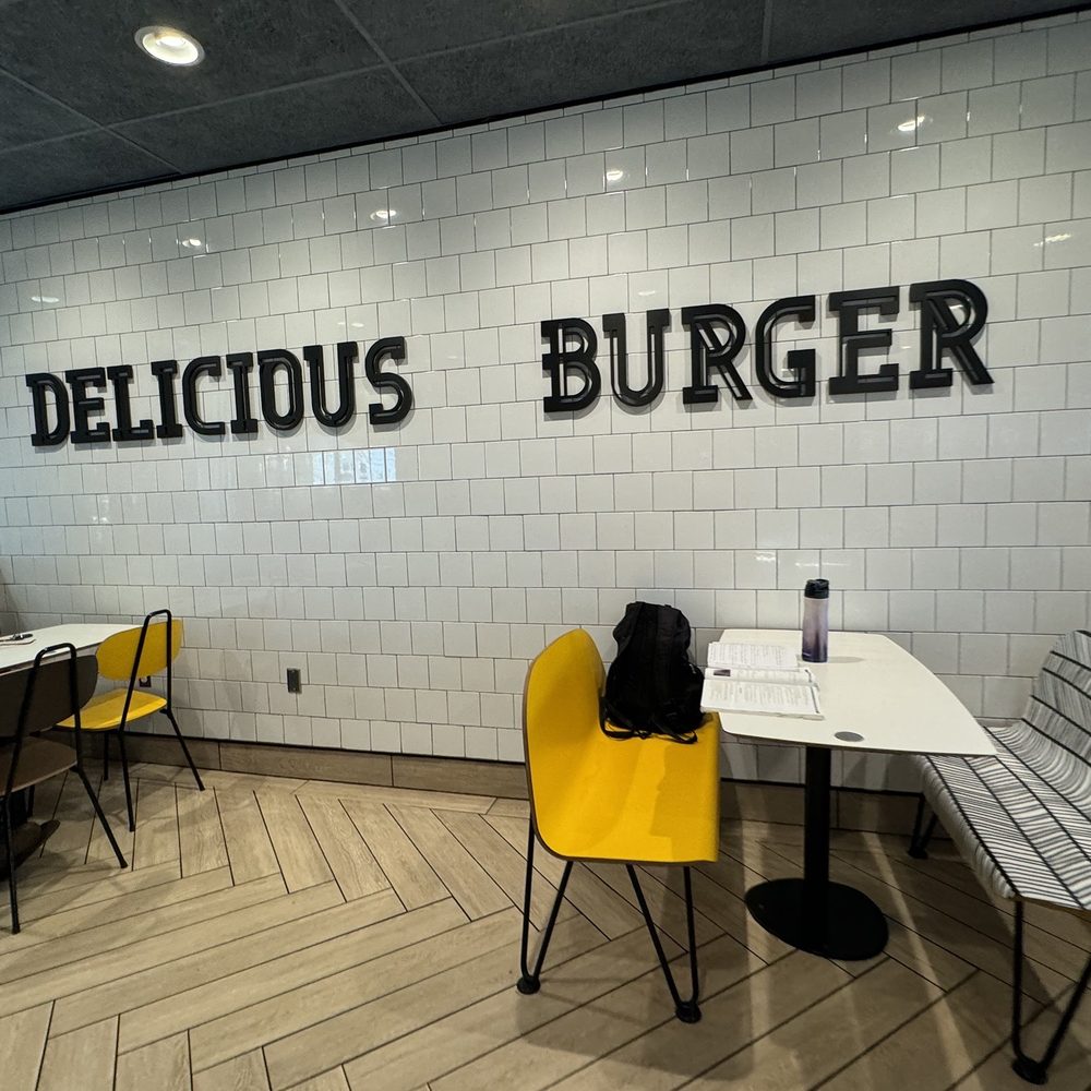 McDonald's - a man sitting at a table in a restaurant - Coffee & Tea Near Me - Seguin, Texas McDonald's - a man sitting at a table in a restaurant - Coffee & Tea Near Me - Seguin, Texas