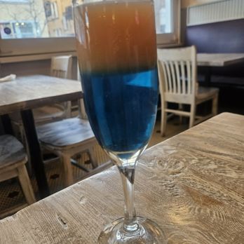 The Brunchery - Chicago Bears Mimosa - Breakfast & Brunch Near Me - Chicago, Illinois