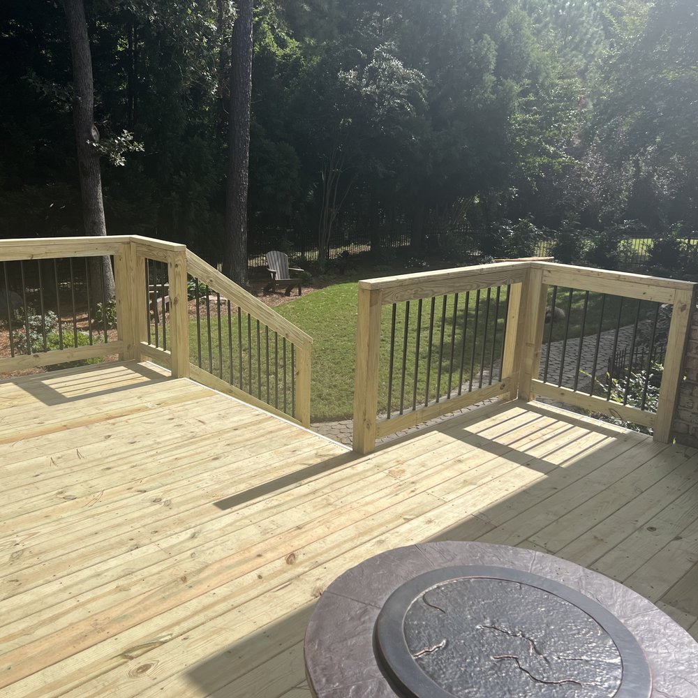 Holley Construction - a deck with a fire pit - Decks & Railing Near Me - Charlotte, North Carolina Holley Construction - a deck with a fire pit - Decks & Railing Near Me - Charlotte, North Carolina