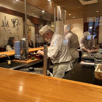 Kurumazushi - a group of chefs preparing food - Sushi Bars Near Me - New York, New York Kurumazushi - a group of chefs preparing food - Sushi Bars Near Me - New York, New York