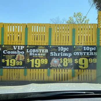 Lemon Pepper Fish & Chicken - a yellow fence - Fish & Chips Near Me - Jacksonville, Florida
