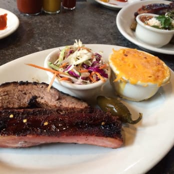 Lamberts Downtown Barbecue - Pork ribs and brisket with mac and slaw - Barbeque Near Me - Austin, Texas Lamberts Downtown Barbecue - Pork ribs and brisket with mac and slaw - Barbeque Near Me - Austin, Texas