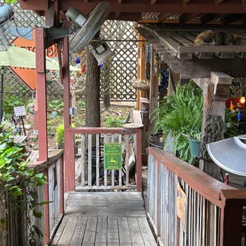 College Street Pub - a porch with a grill and chairs - Pubs Near Me - Waxahachie, Texas College Street Pub - a porch with a grill and chairs - Pubs Near Me - Waxahachie, Texas