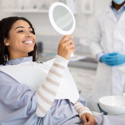 Absolute Dental - West Craig - Happy Absolute Dental patient after their dental visit.