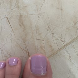 Lulu Nails & Spa - You can see the growers since he filed my toes down so much and severely damaged them. This is 6 weeks post that pedicure.