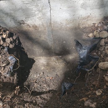 CrackXperts - Foundation crack before - Waterproofing Near Me